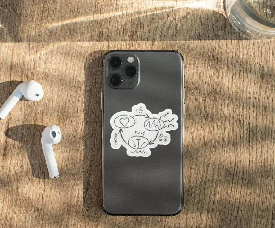 3 Circles sticker on the back of a black phone